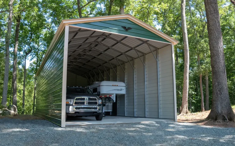 Key Factors to Consider When Buying a Metal Carport Kit 2 photo of green metal carport kit with a truck and RV parked inside