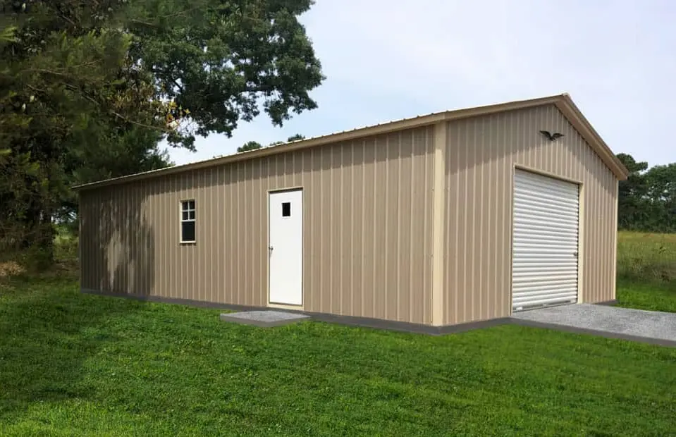 Single car metal garage with door and window. Wide 1 car garage, oversized garage building. Beige metal 1 car garage with rolling overhead garage door and extra storage